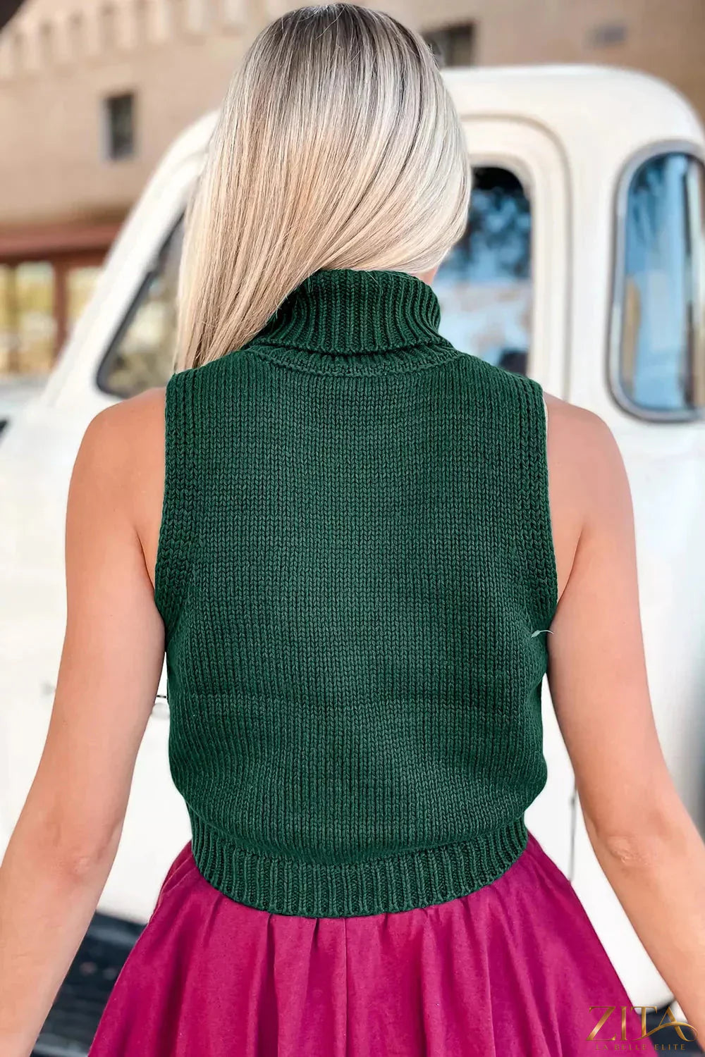 Zita La Belle Elite festive candy cane embroidered turtleneck sweater vest featuring red and white holiday-themed design.
