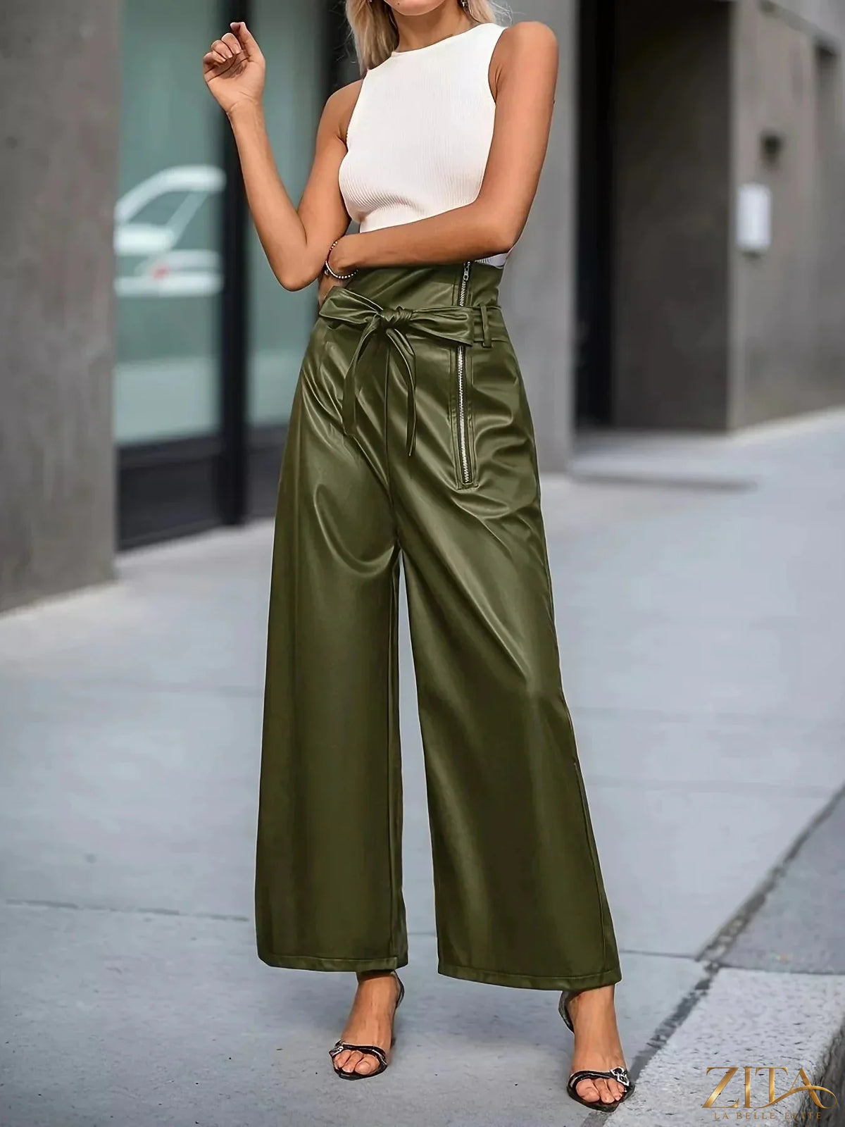 High-waisted faux leather tie-waist wide-leg pants by Zita La Belle Elite, shown styled with a relaxed fit and sleek finish.