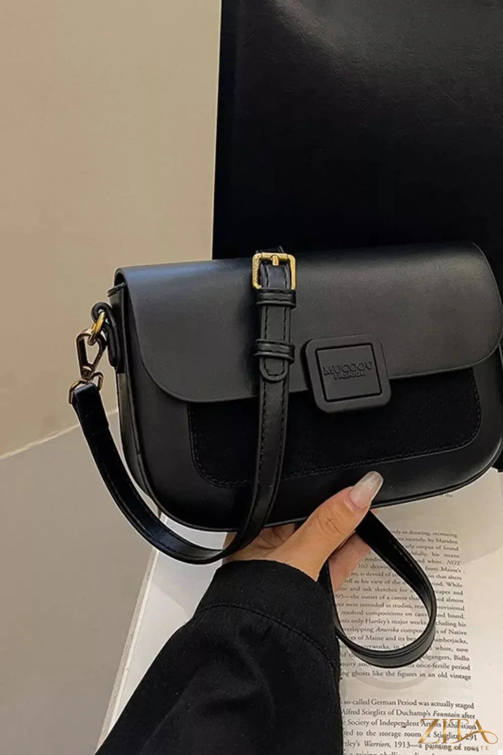 Zita La Belle Elite flap closure shoulder bag with sleek design and adjustable strap, crafted from high-quality materials.