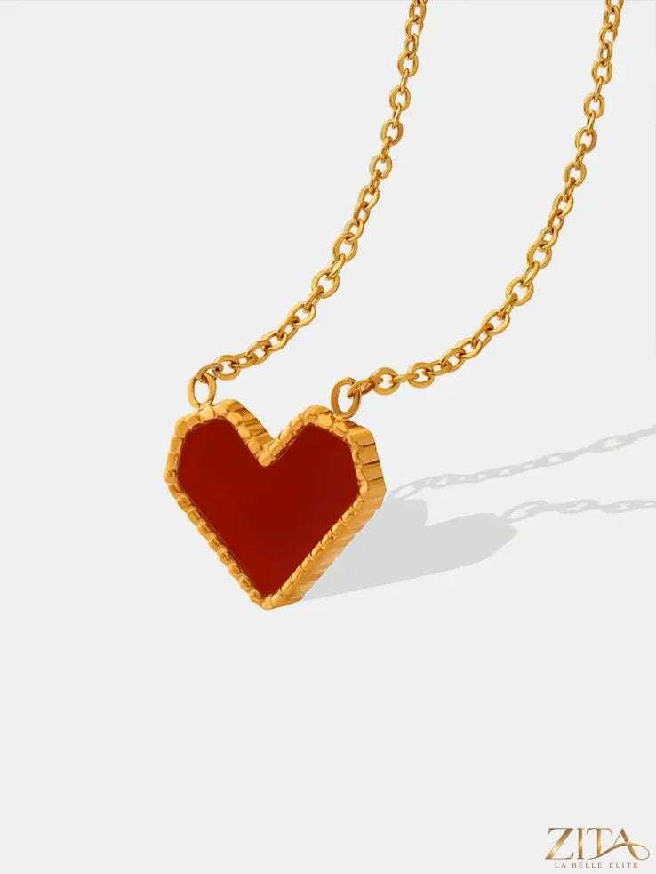 Titanium steel heart necklace by Zita La Belle Elite featuring a sleek, polished pendant on a delicate chain.
