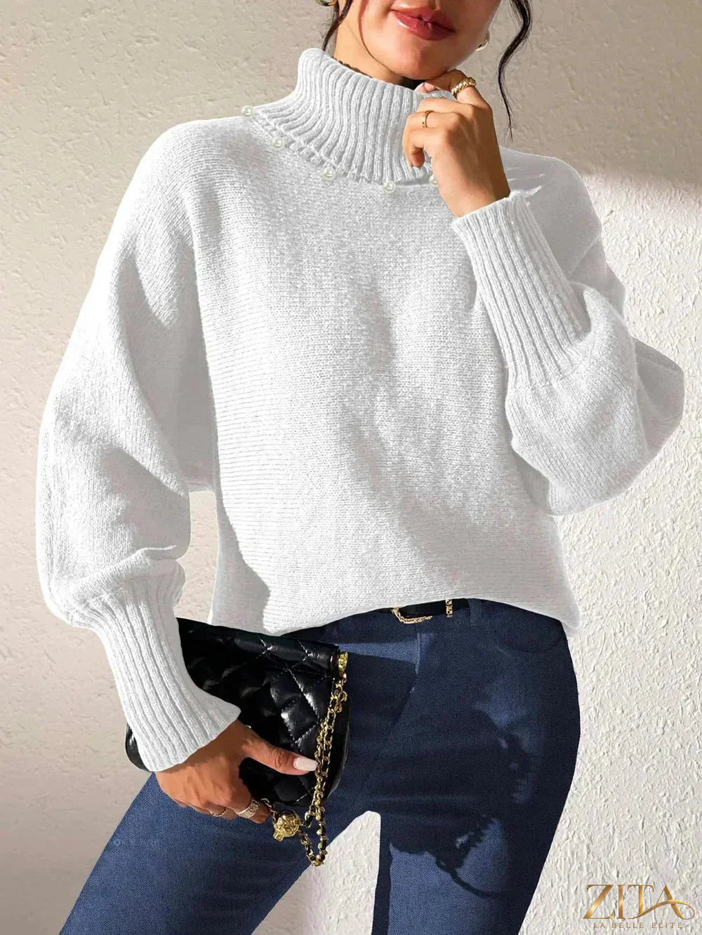 Zita La Belle Elite long sleeve turtleneck sweater in a cozy, fitted style, displayed in a neutral color.