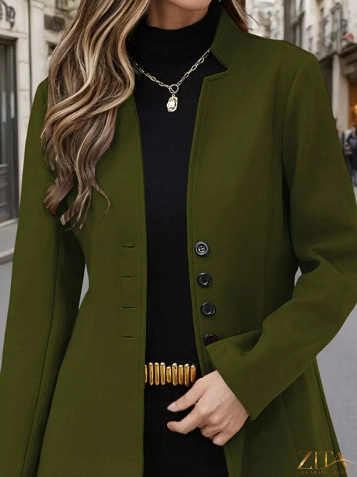 Zita La Belle Elite button-up long sleeve coat displayed on a hanger, showing the stylish collar and sleek fabric texture.