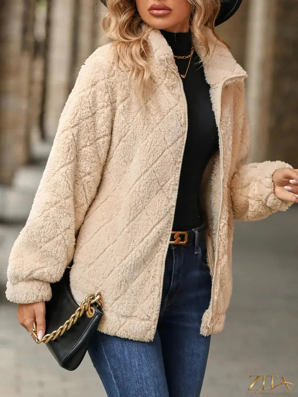 Zita La Belle Elite fuzzy pocketed zip-up jacket with front pockets and a soft, cozy texture, shown in a close-up image.