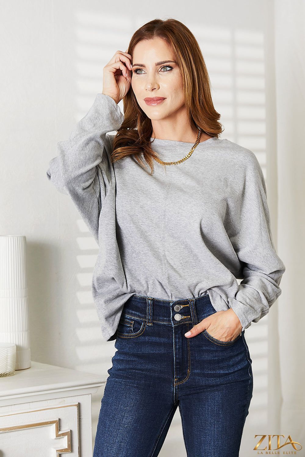 Zita La Belle Elite Double Take long sleeve top with seam details and round neckline, black fabric, close-up view