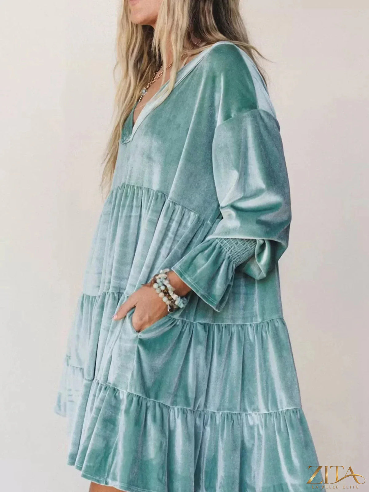 Velvet tiered mini dress with balloon sleeves by Zita La Belle Elite, featuring a chic, textured fabric and stylish layered design.