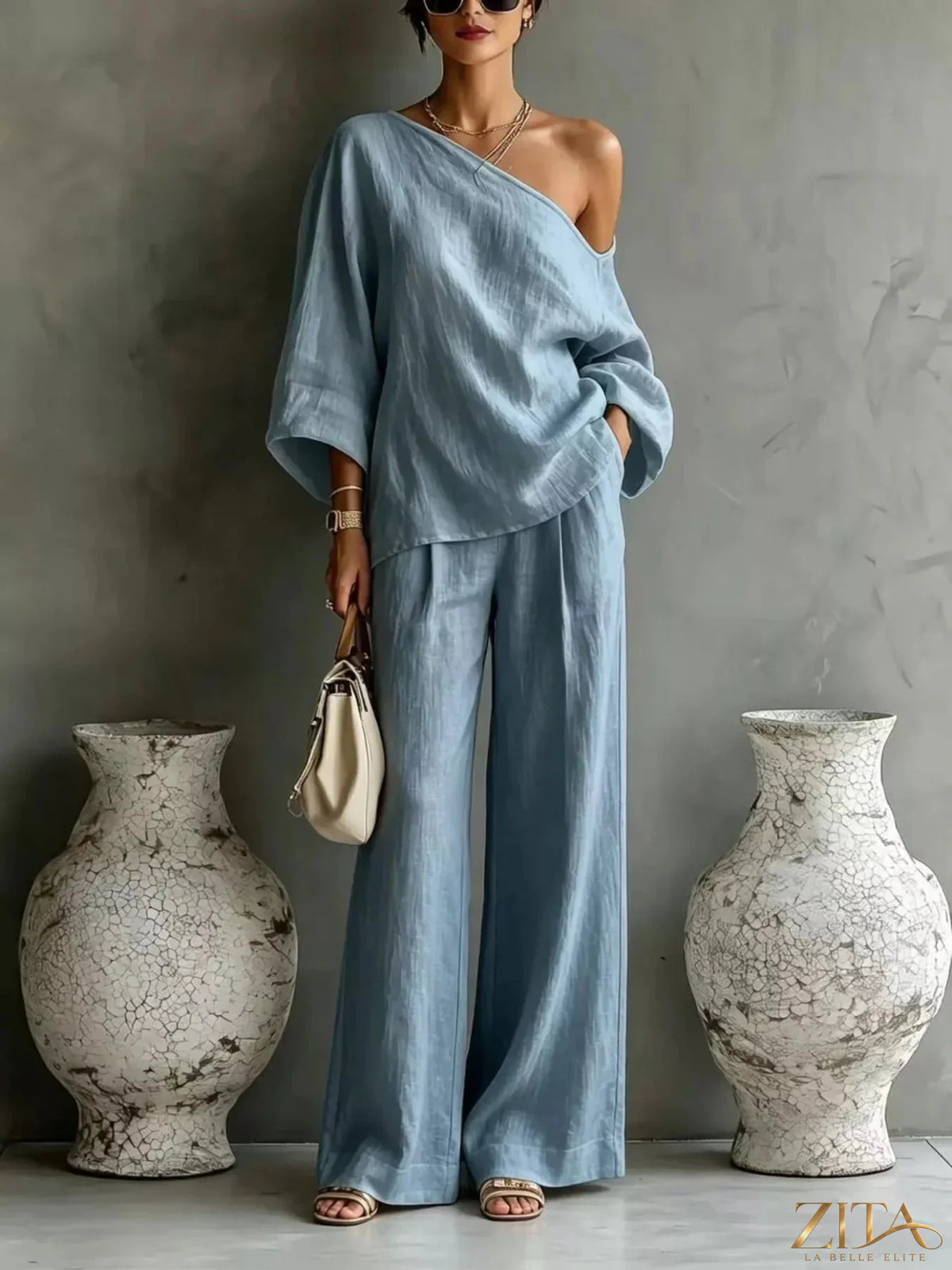 Zita La Belle Elite one shoulder top and wide leg pants set in stylish fabric, featuring a modern, chic design.