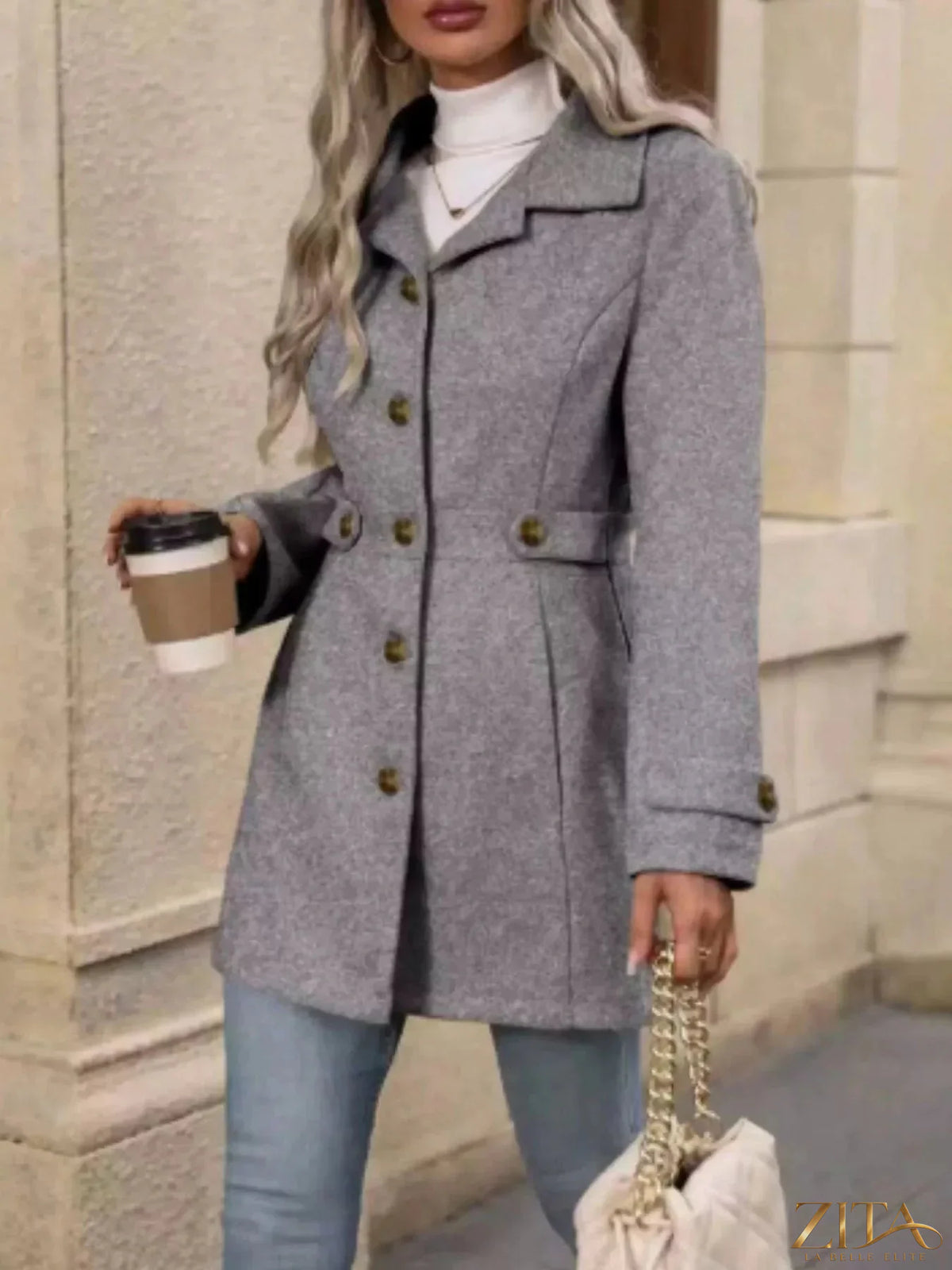 Zita La Belle Elite button-up long sleeve coat in neutral fabric with a classic collar and front buttons.