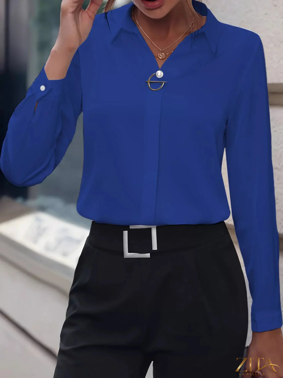 Long sleeve satin blouse by Zita La Belle Elite, shown in a stylish design with smooth, shiny fabric and elegant fit.