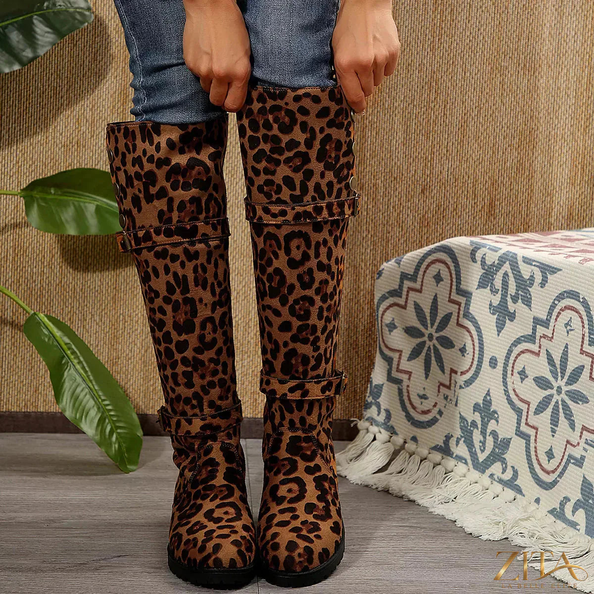 Leopard print block heel boots by Trendsi featuring stylish design and sturdy heel for a fashionable look.