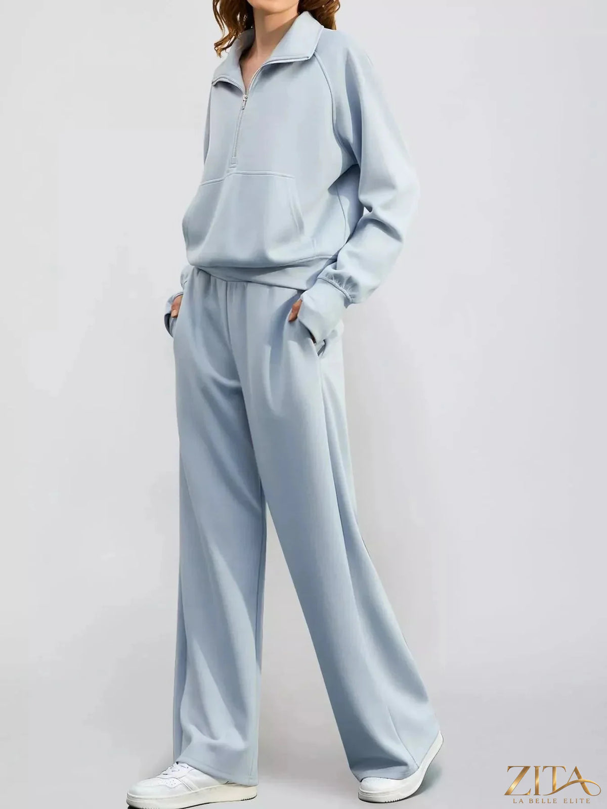 Zita La Belle Elite half-zip sweatshirt and wide-leg pants set, made of soft fabric, in a stylish casual outfit.