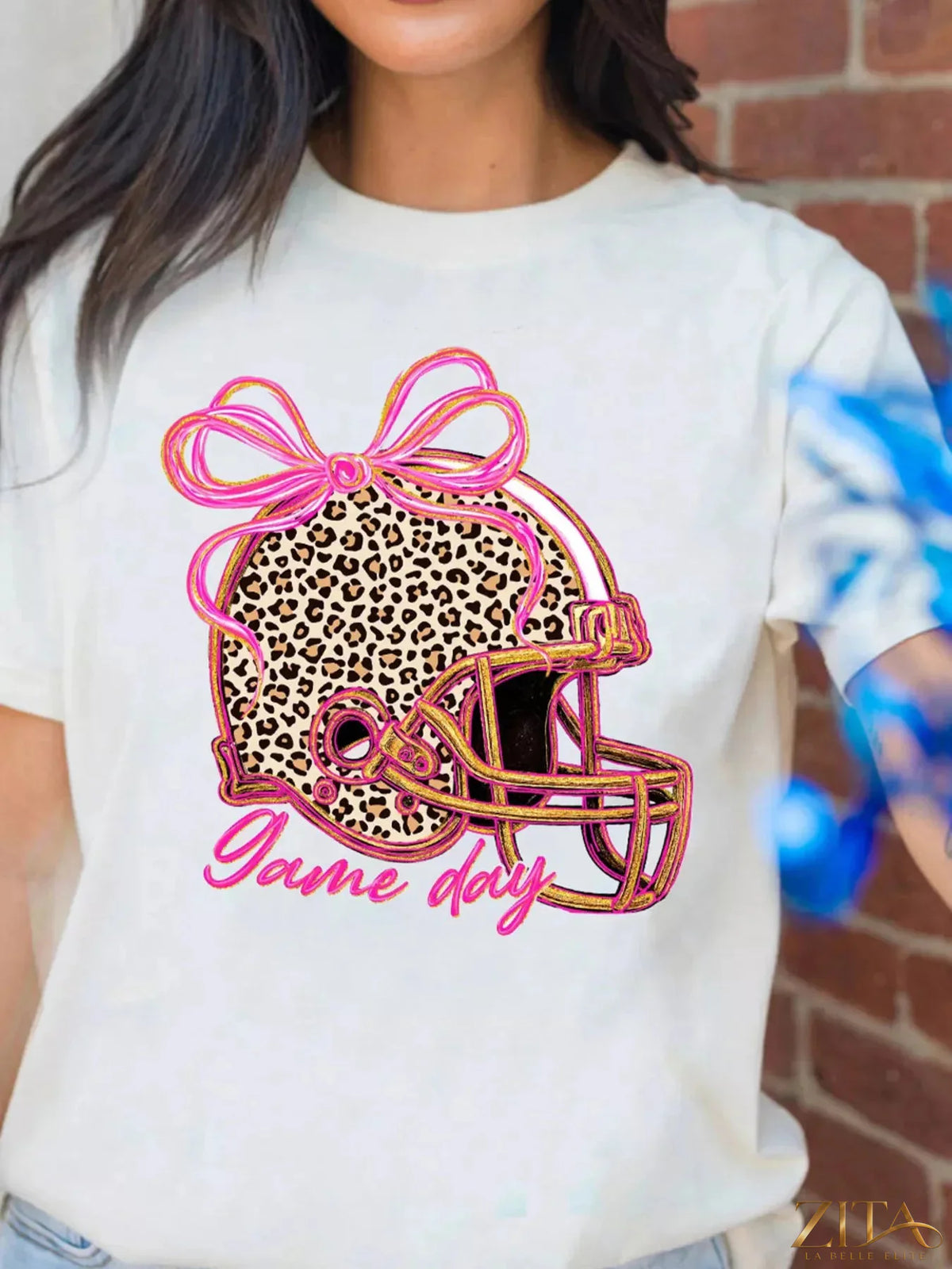 Leopard graphic T-shirt featuring game day helmet design, trendy Trendsi brand casual wear for sports fans.