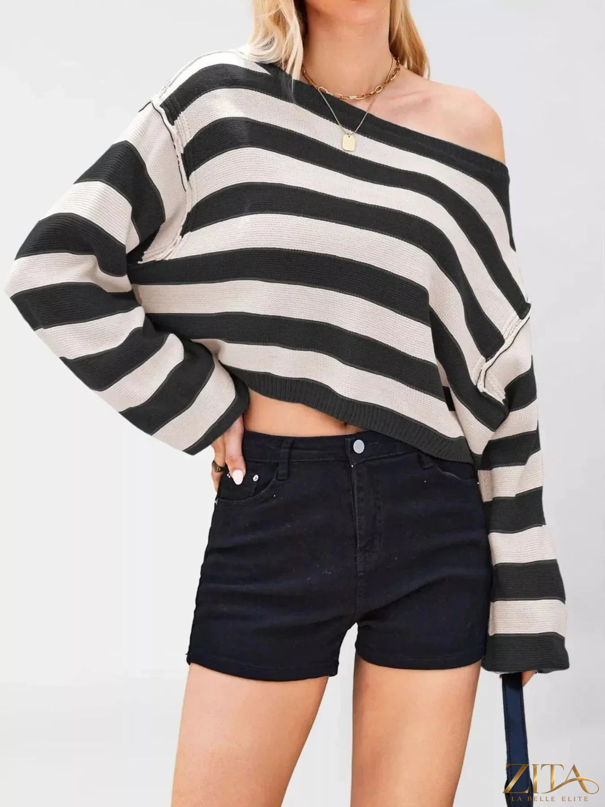 Striped boat neck sweater by Trendsi featuring blue and white horizontal stripes, long sleeves, and a cozy fit.