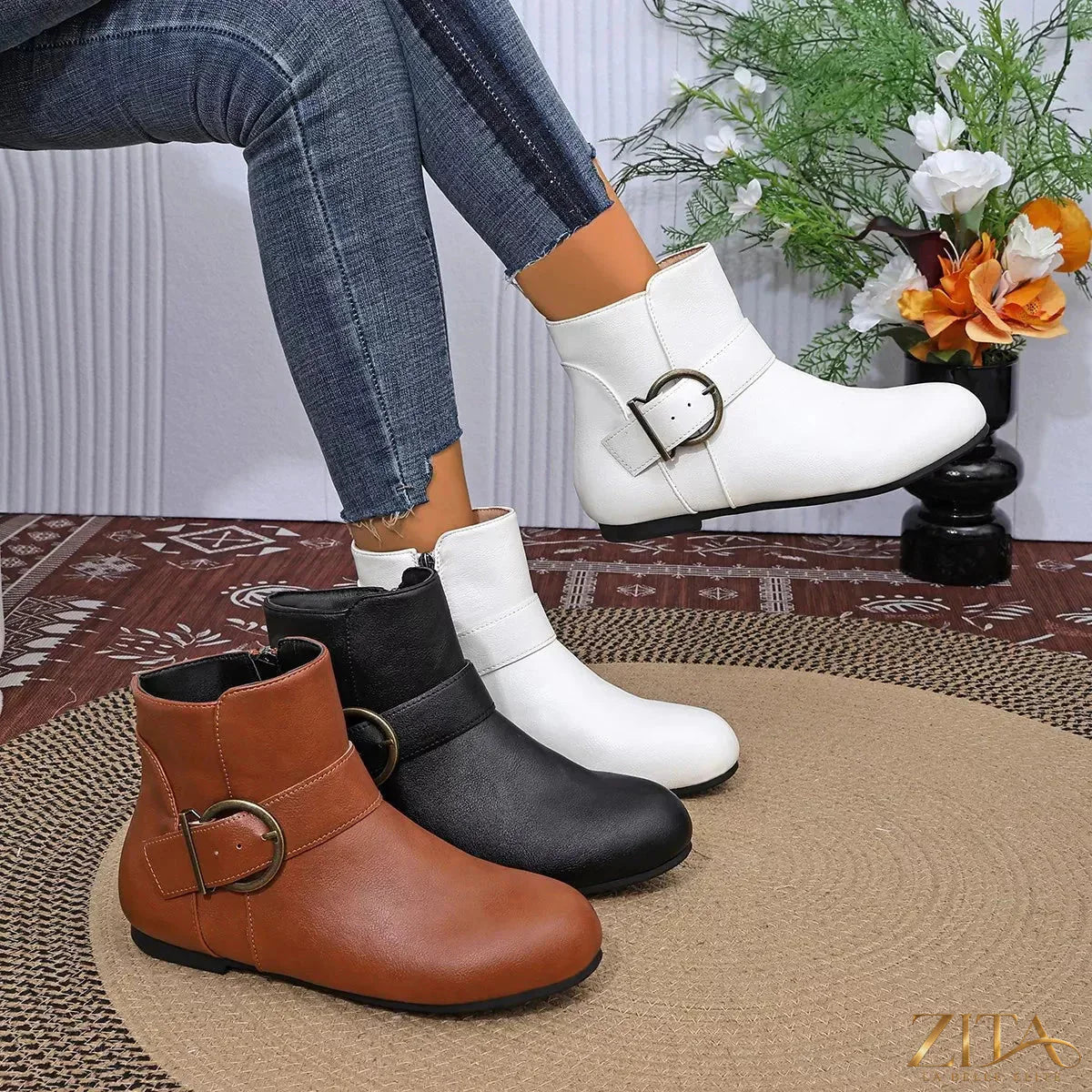 Round toe ankle boots by Trendsi featuring a sleek design, ankle height, and stylish look, perfect for casual or chic outfits.
