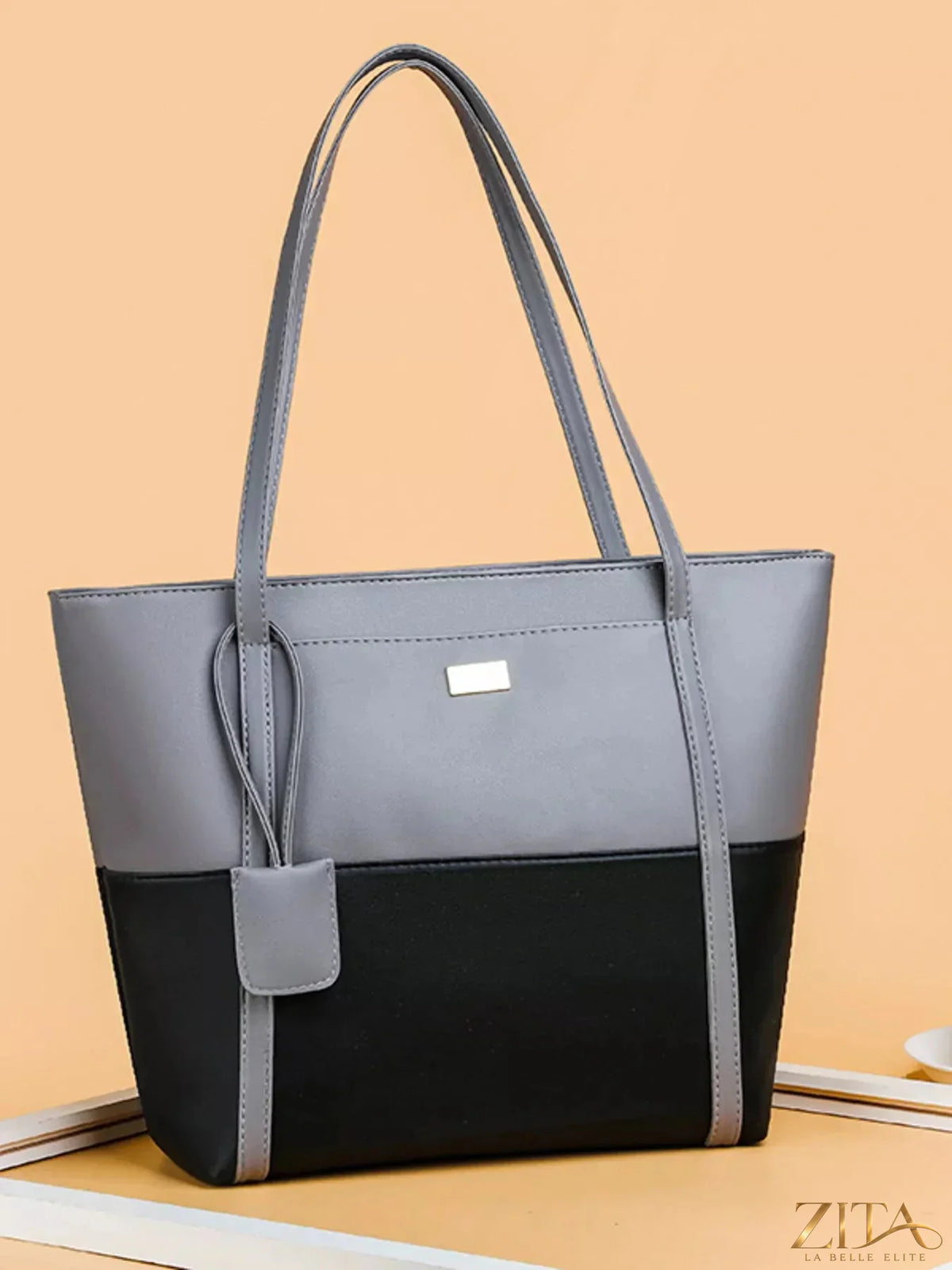 Two-tone tote bag by Zita La Belle Elite with sturdy handles and spacious interior, showcasing stylish and functional design.