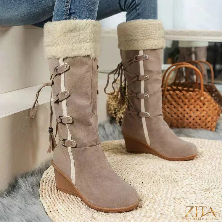 Zita La Belle Elite round toe wedge boots with stylish design and chunky heel, made of black leather material.