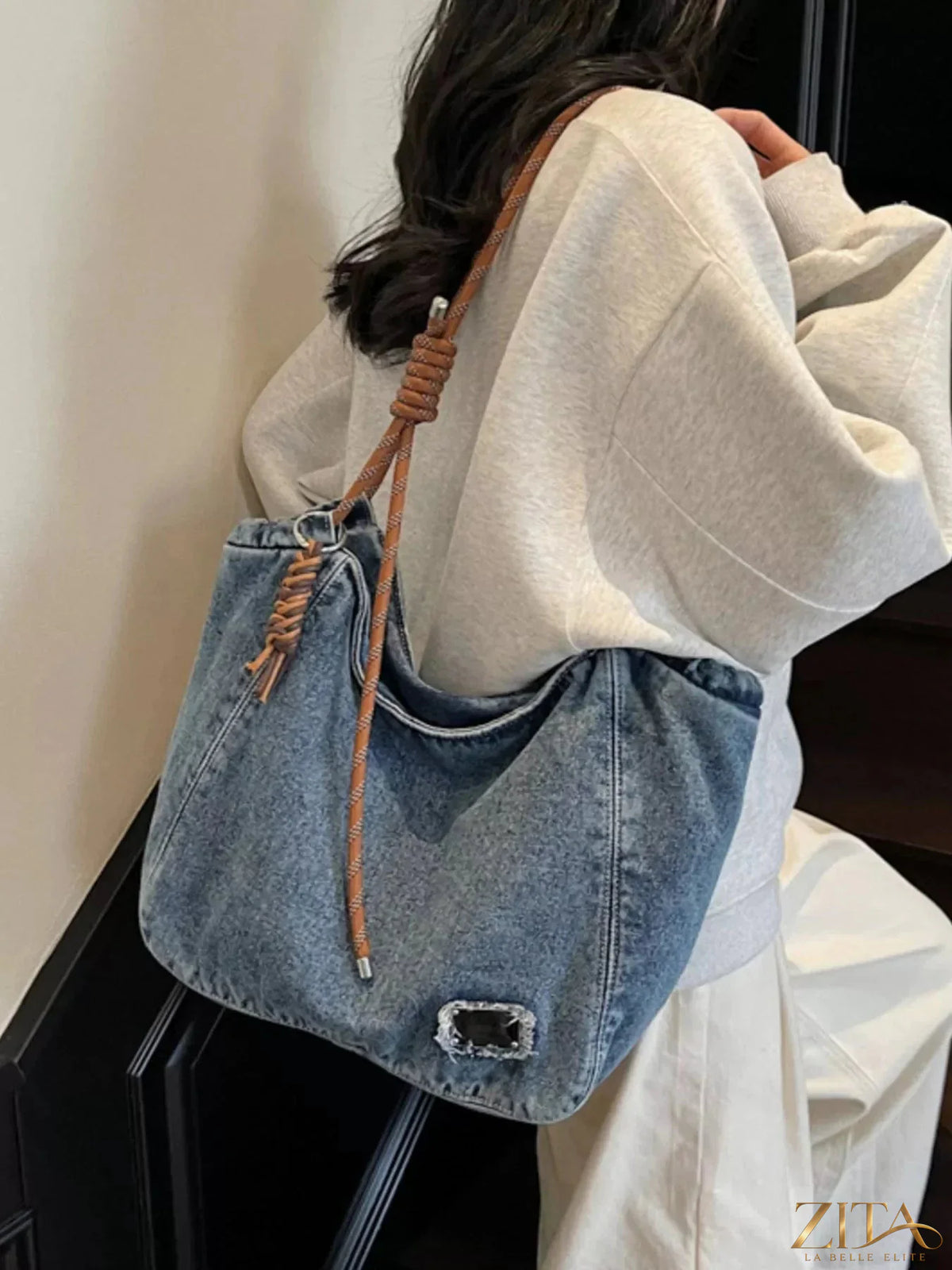 Zita La Belle Elite denim hobo tote bag with rope strap, casual fashion accessory, showing textured denim fabric and stylish design.