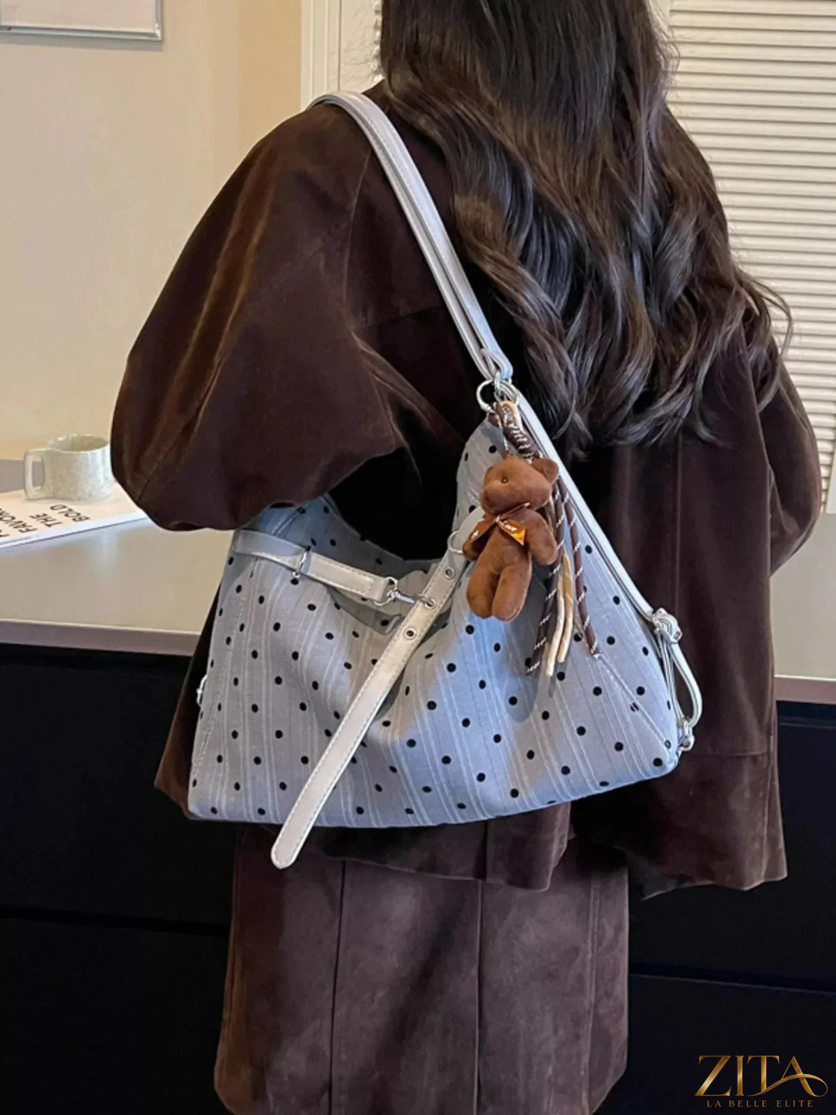 Zita La Belle Elite polka dot shoulder bag with adjustable strap and stylish design, perfect for casual and elegant outfits.
