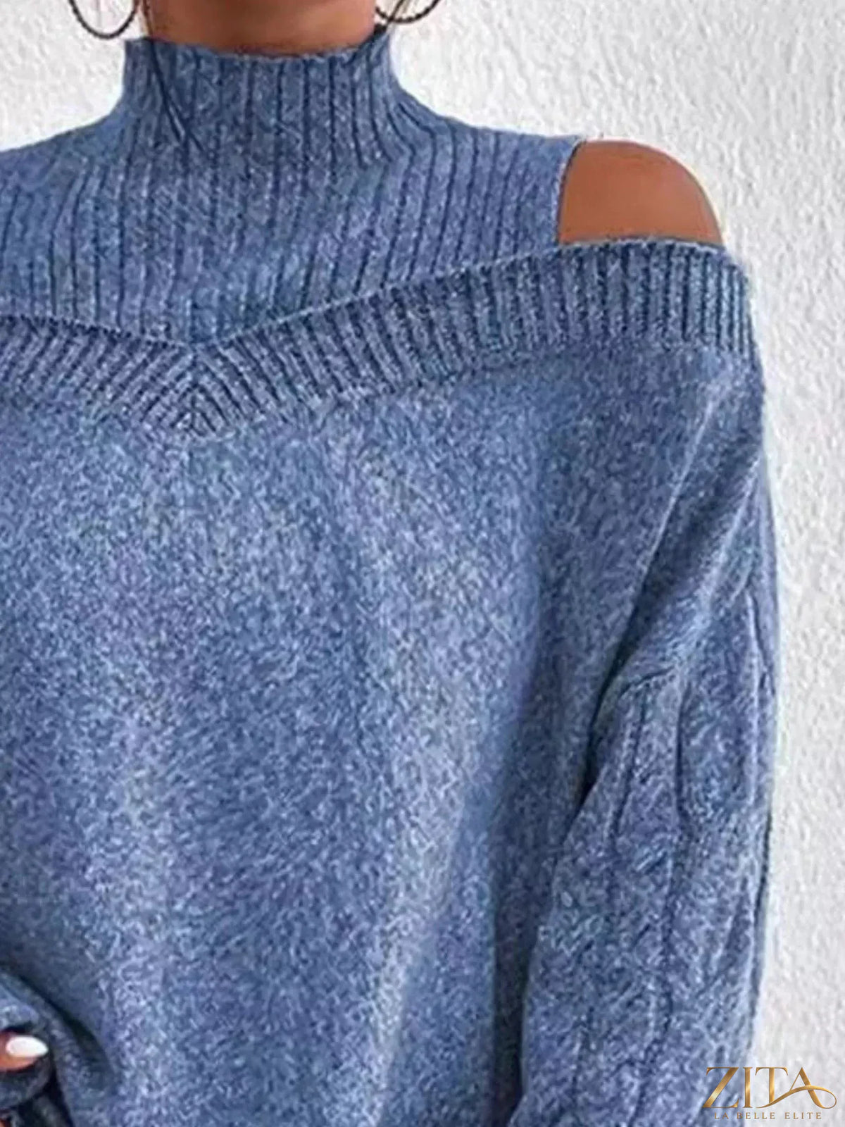 Zita La Belle Elite cold shoulder turtleneck sweater in cozy knit with cut-out shoulder details and high neckline.