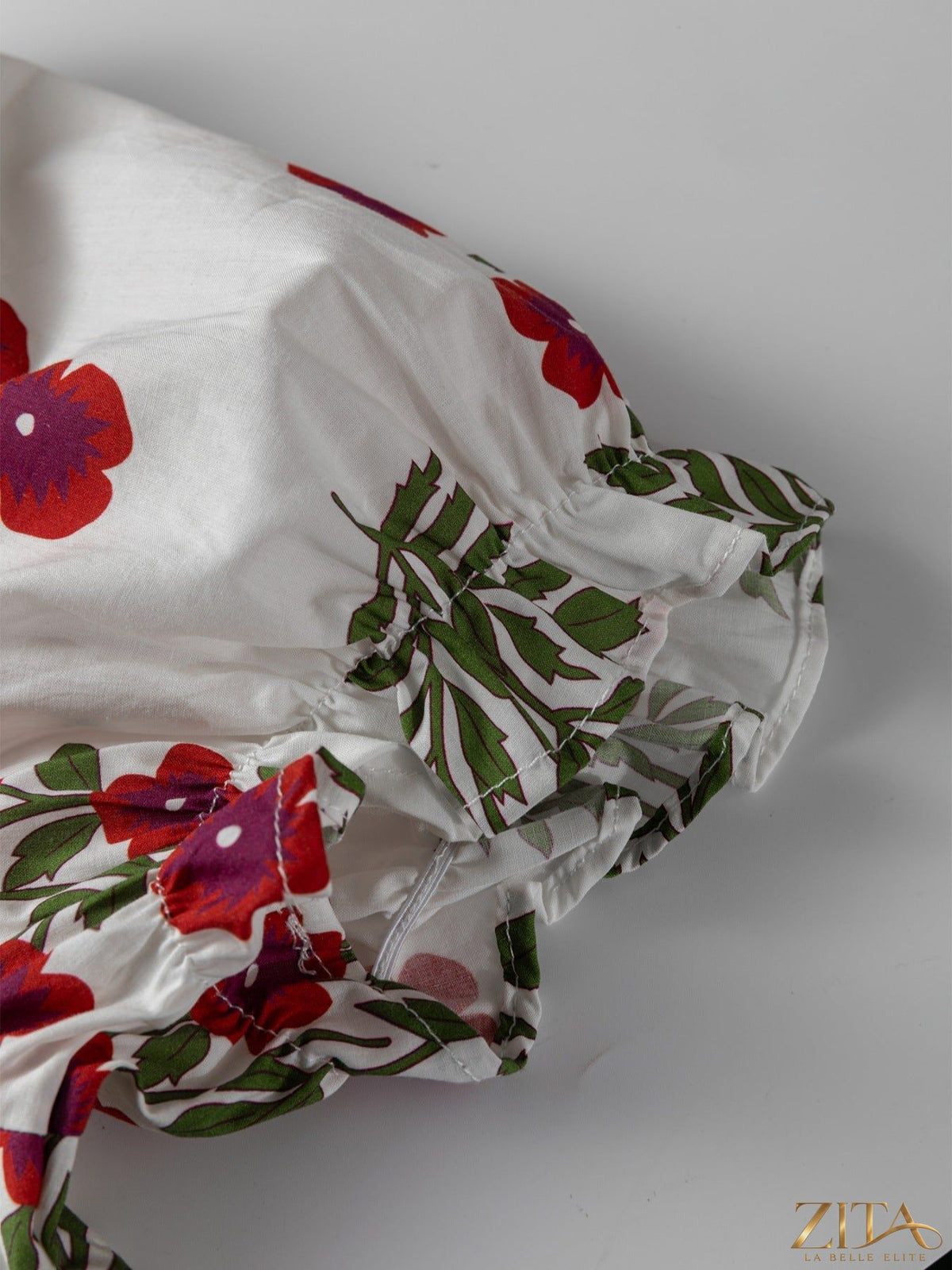 Zita La Belle Elite floral print casual mini dress with short sleeves and a fitted waist, perfect for summer outings.