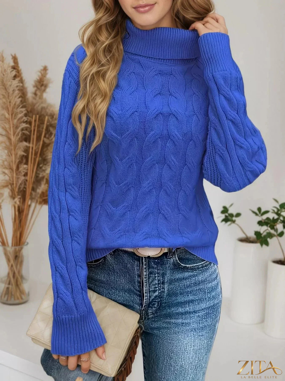 Zita La Belle Elite cable-knit turtleneck sweater in cozy, textured knit with a high collar and fitted style.