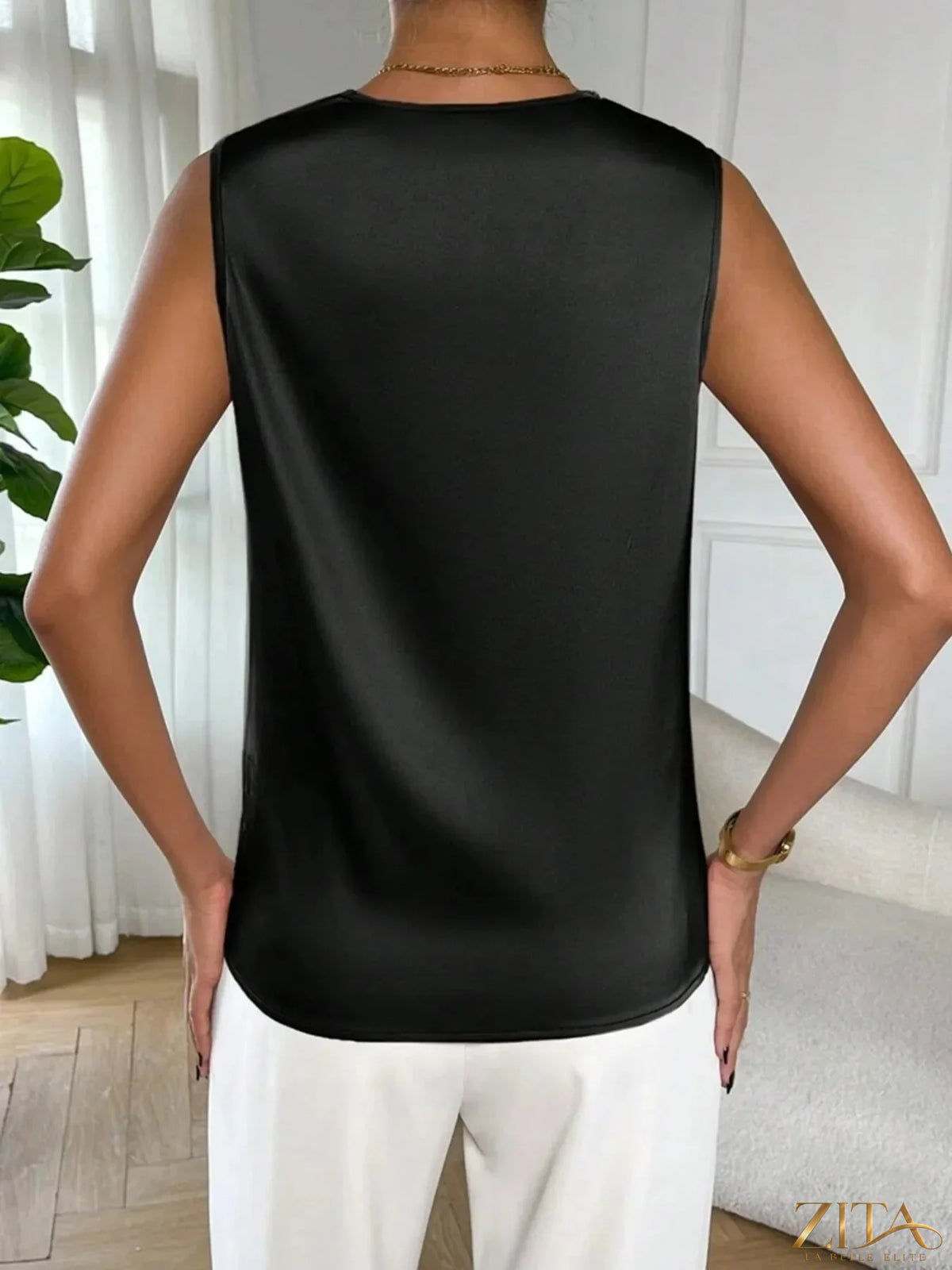 Zita La Belle Elite satin cowl neck sleeveless blouse with draped neckline and smooth fabric, shown on a white background.