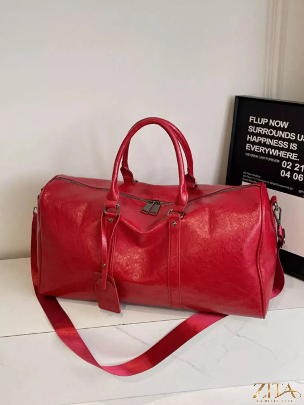 Trendsi PU leather duffle bag with sturdy handles, spacious interior, and sleek design, perfect for travel or gym use.