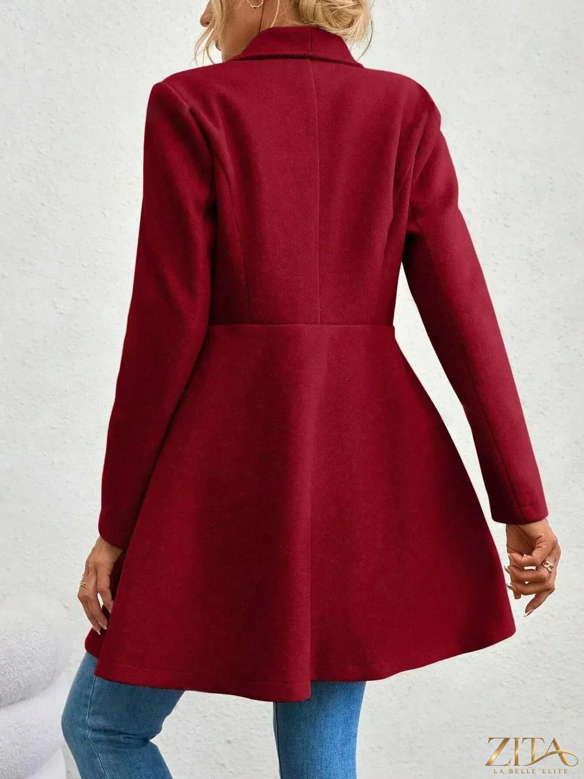 Zita La Belle Elite double-breasted wool blend coat displayed on a hanger, showcasing its tailored fit and classic design.