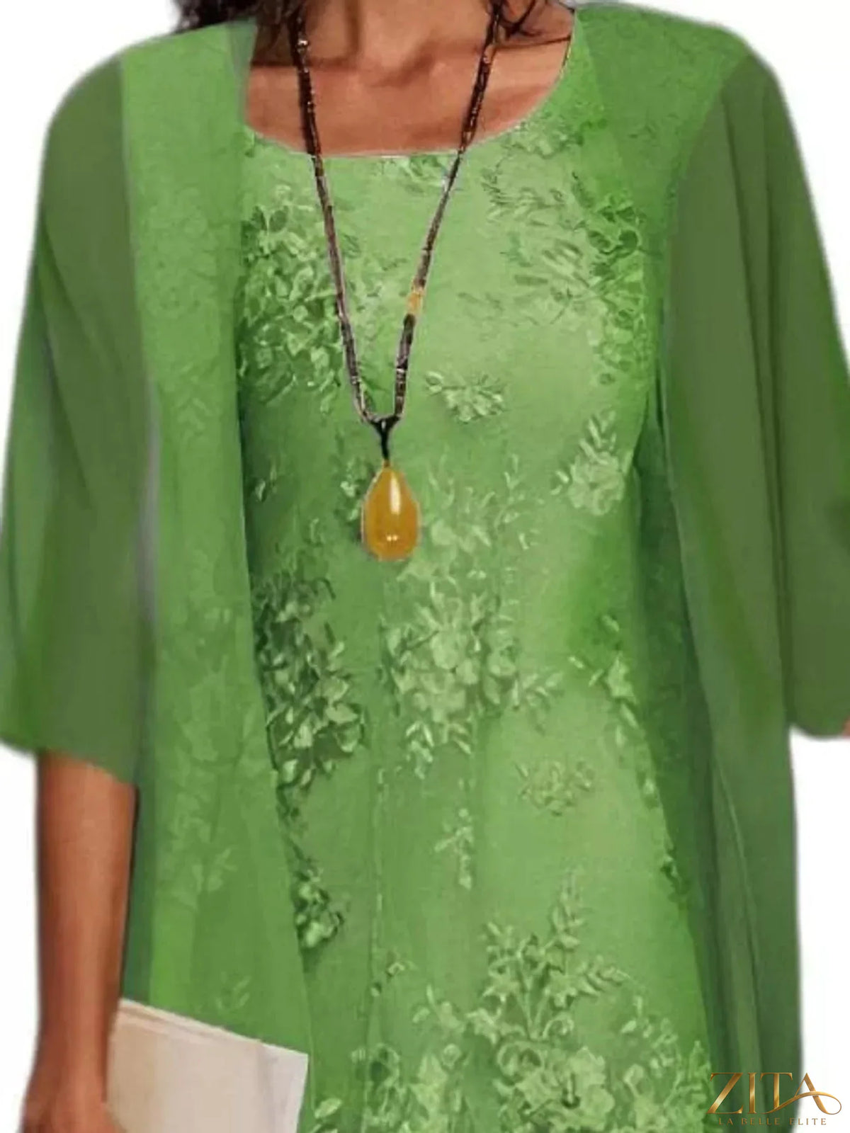 Plus size elegant lace overlay dress with matching chiffon cardigan set by Zita La Belle Elite, shown on a model.
