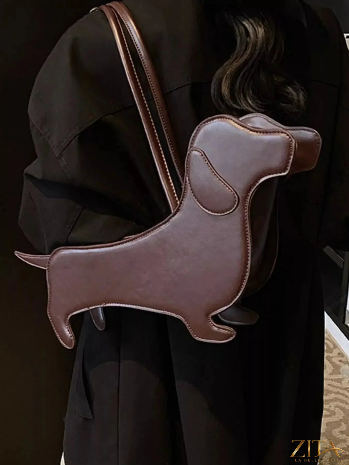 Zita La Belle Elite Dachshund-shaped shoulder bag with detailed dog design, black accents, and adjustable strap.