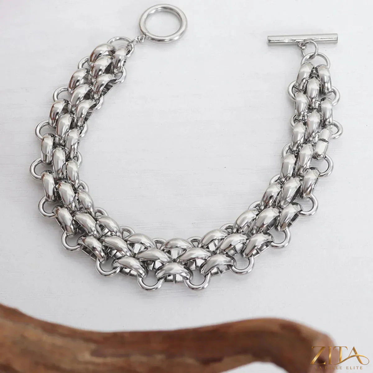 Gold chain link jewelry set featuring a necklace and bracelet with sleek, interconnected links in a stylish gold finish.