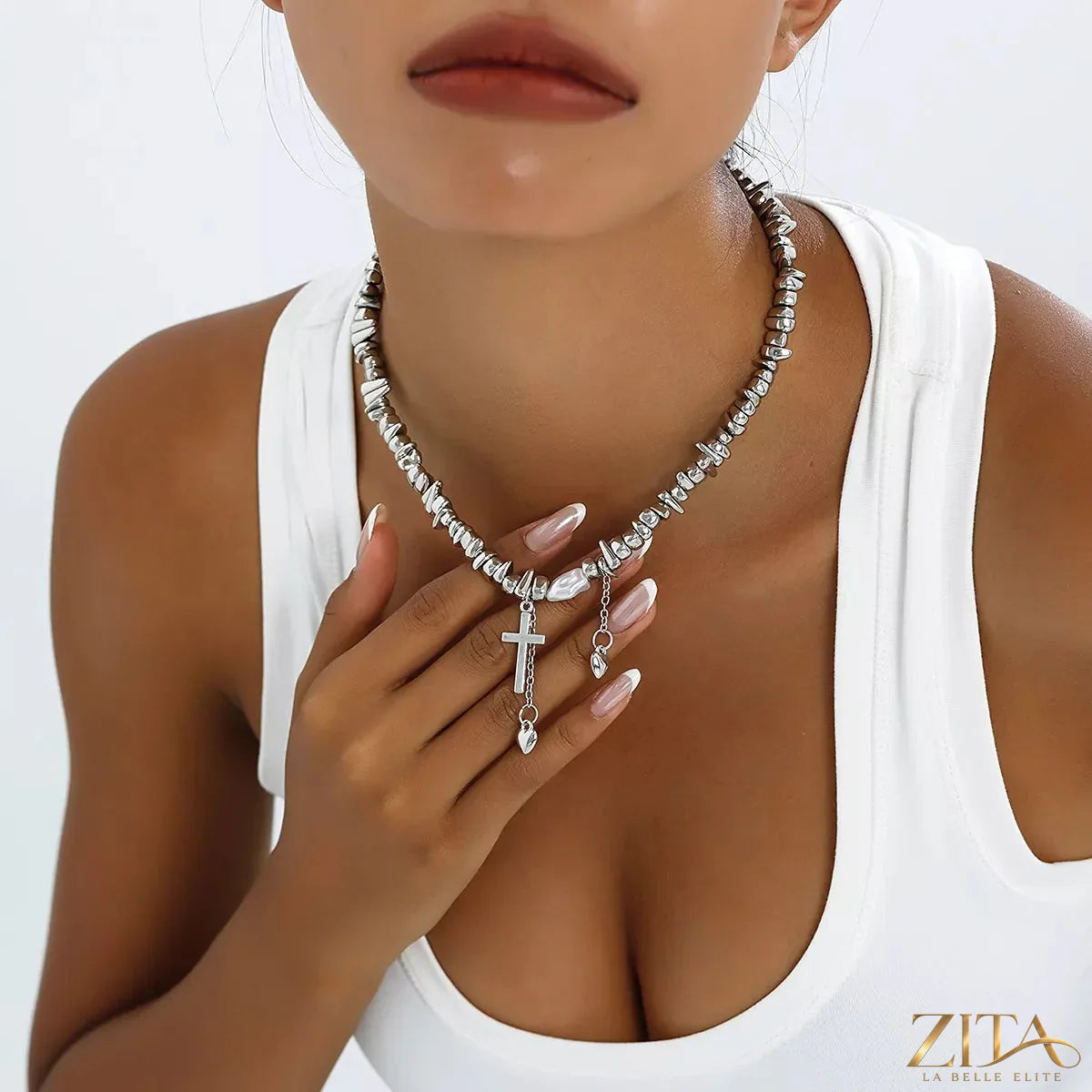 Zita La Belle Elite chunky chain cross pendant necklace featuring a bold gold-tone chain and a cross charm design.