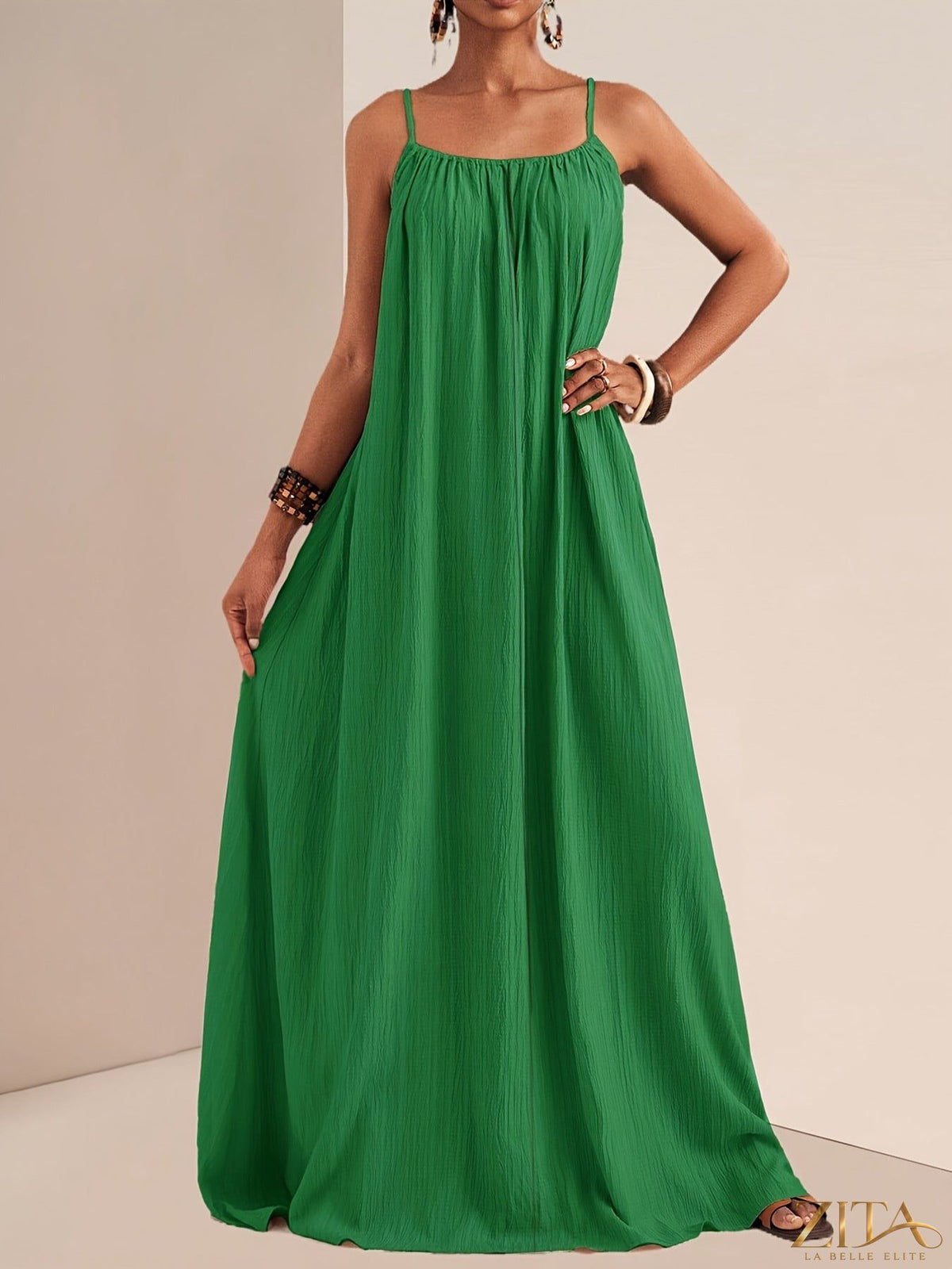 Flowy spaghetti strap maxi dress by Zita La Belle Elite, featuring a lightweight, elegant design perfect for summer or casual wear.