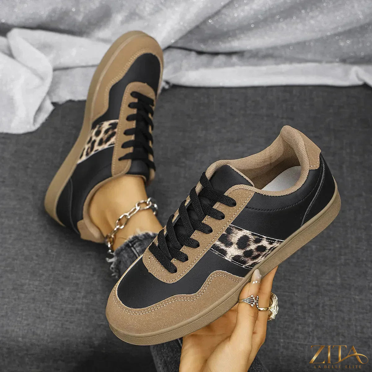 Leopard print lace-up sneakers with round toe from Zita La Belle Elite, featuring a stylish and comfortable design.
