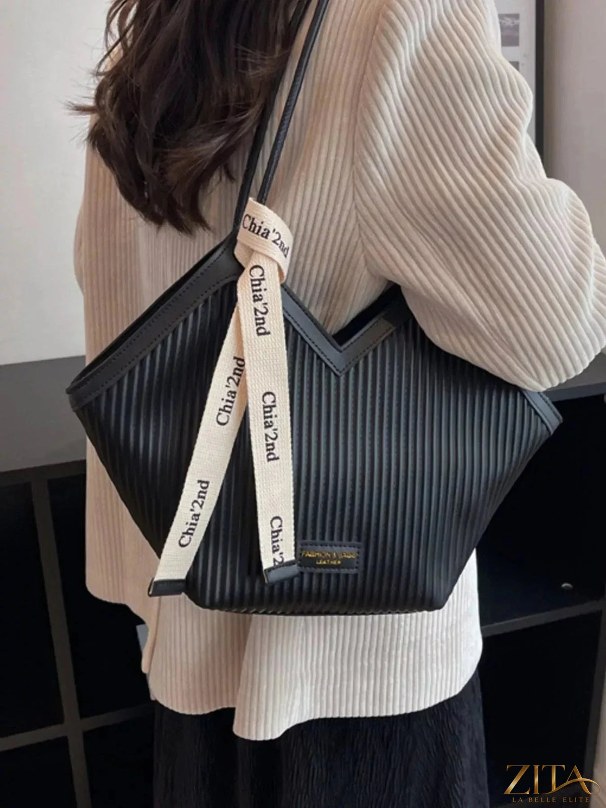 Zita La Belle Elite textured leather shoulder bag with a sleek design and silver hardware, featuring a spacious interior and adjustable strap.
