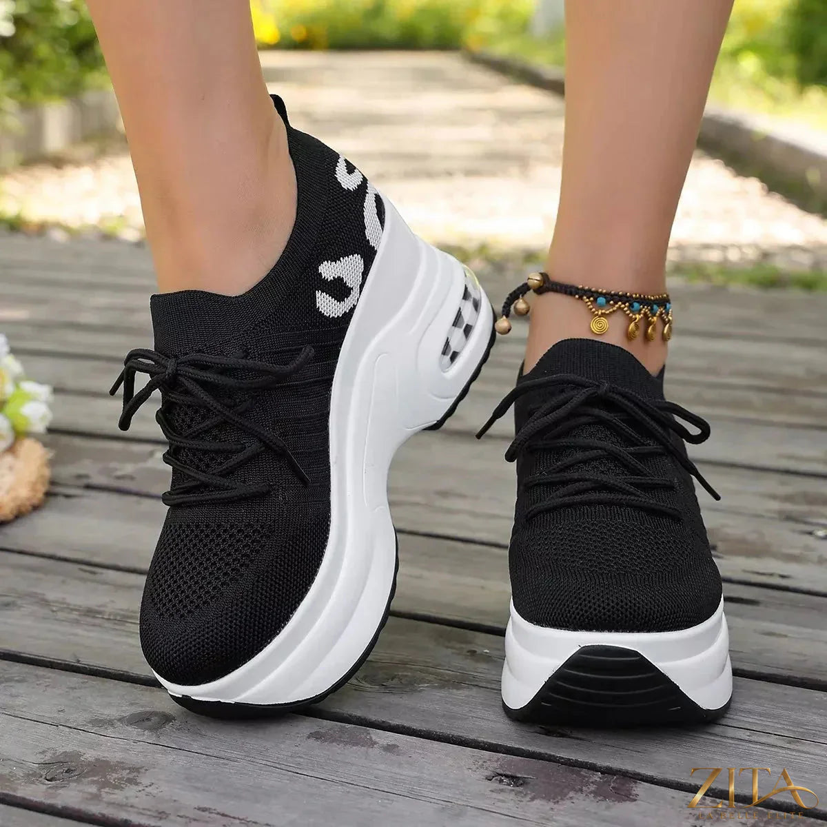 Zita La Belle Elite round toe platform sneakers with thick soles and stylish design, shown in a front view.