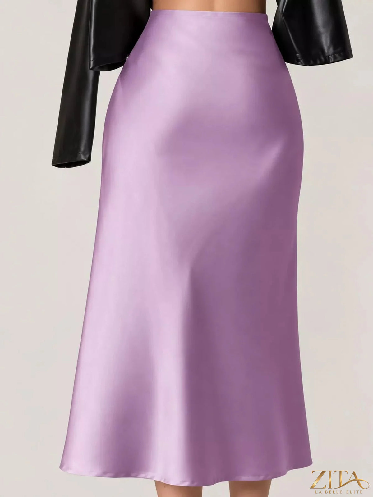 High-waisted satin midi skirt by Trendsi, shown in soft sheen fabric with a flowing silhouette and elegant design.
