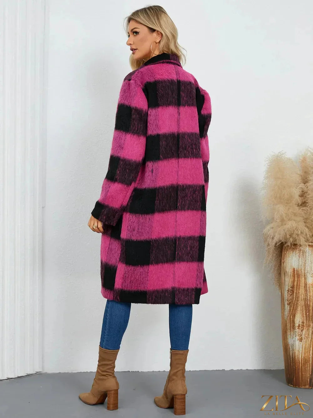 Zita La Belle Elite plaid double-breasted long sleeve coat hanging on a rack with a classic checkered pattern