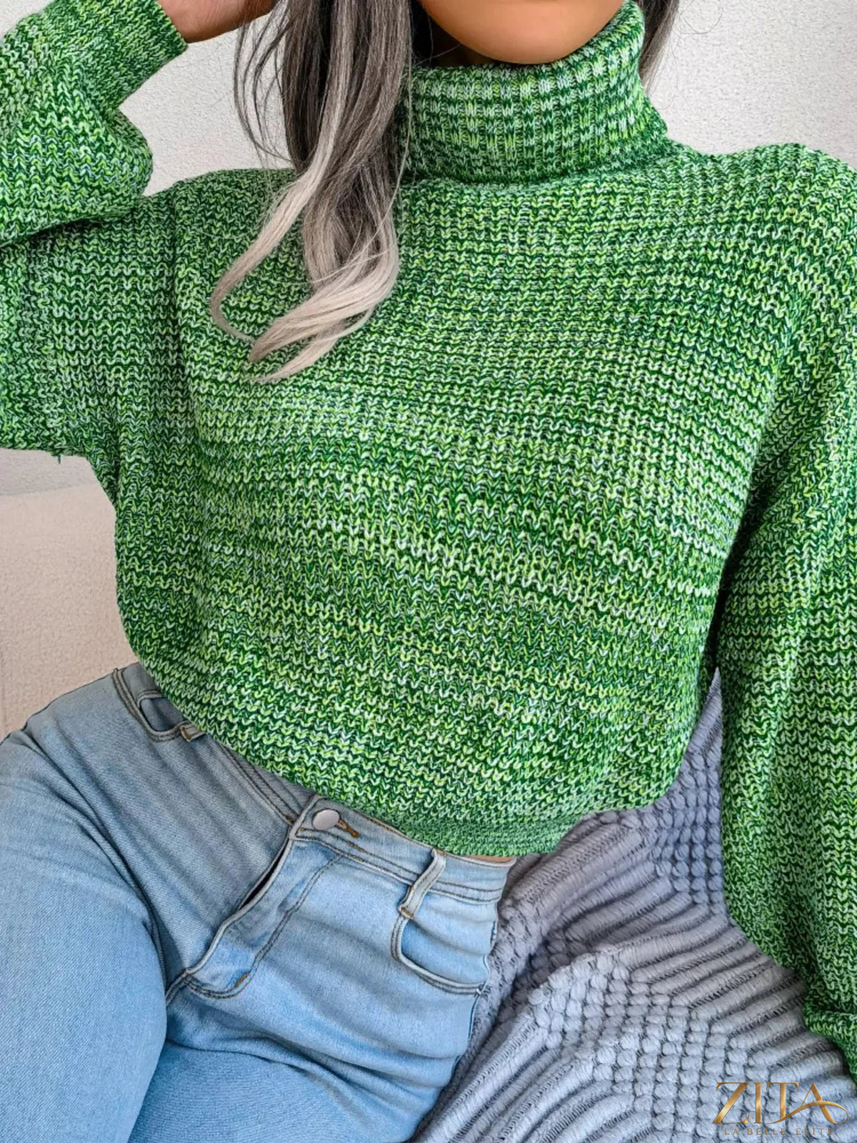 Trendsi turtleneck dropped shoulder sweater in soft knit fabric, featuring a cozy fit and ribbed cuffs, perfect for casual wear.
