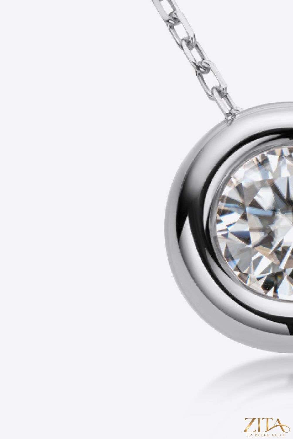 Sterling silver necklace with 1 carat moissanite pendant from Zita La Belle Elite, showcasing the sparkling gemstone and elegant chain.