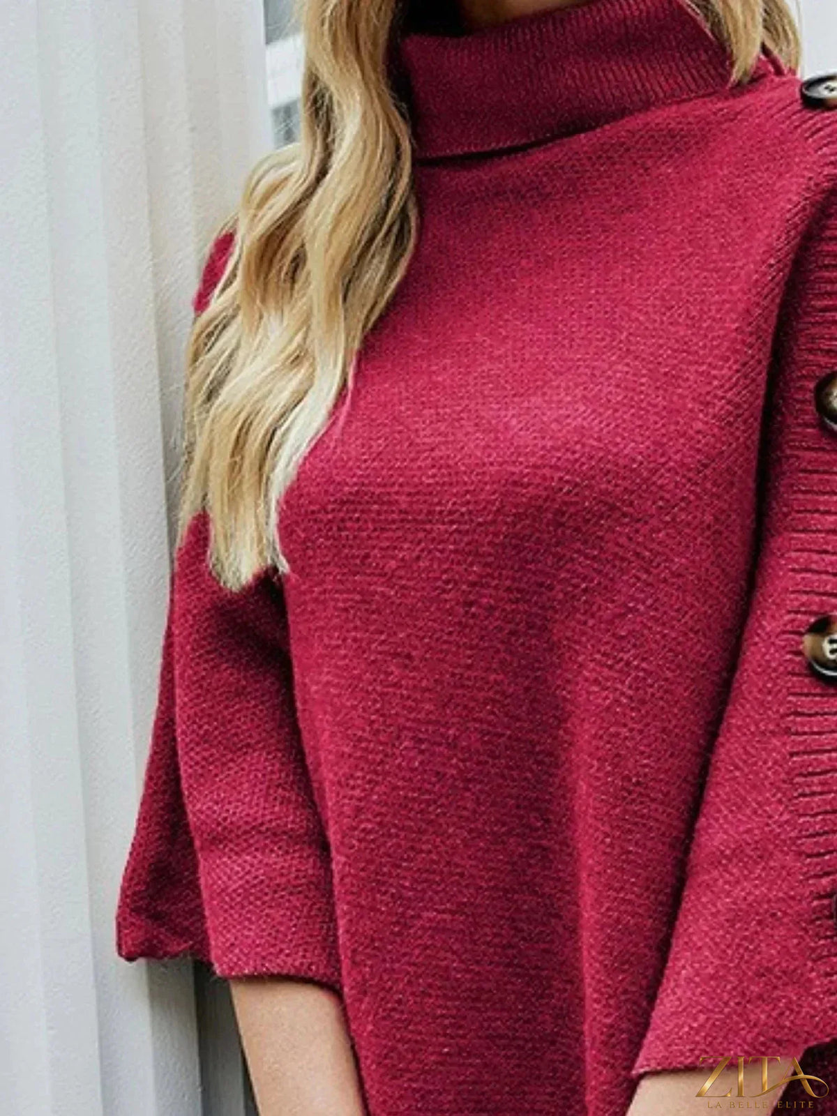 Zita La Belle Elite button-decor turtleneck poncho pullover in cozy fabric, featuring a stylish turtleneck and decorative buttons.