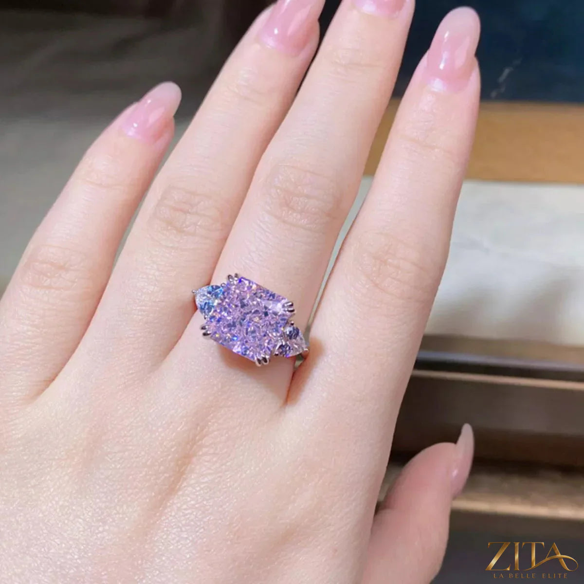 Sterling silver zircon geometric ring with modern design, featuring sparkling stones and sleek silver band.