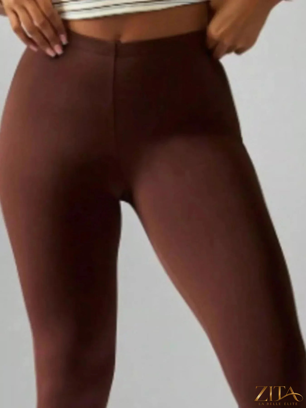 High-waisted Zita La Belle Elite active capri leggings with a sleek fit and stretchy fabric, ideal for workout and athletic wear.