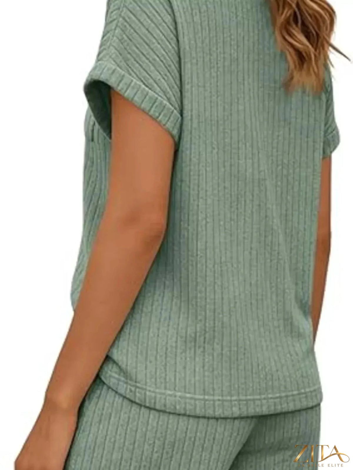 Casual ribbed knit tee and shorts set by Trendsi, featuring a comfortable, stylish matching top and bottoms for relaxed wear.