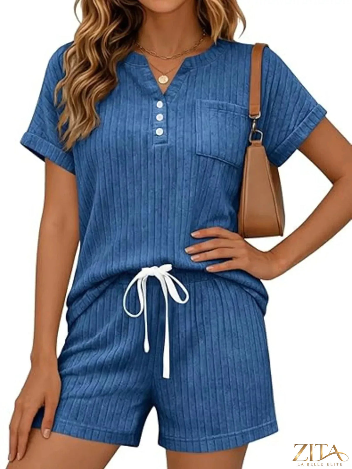 Casual ribbed knit tee and shorts set by Trendsi, featuring a comfortable, stylish matching top and bottom in soft fabric.