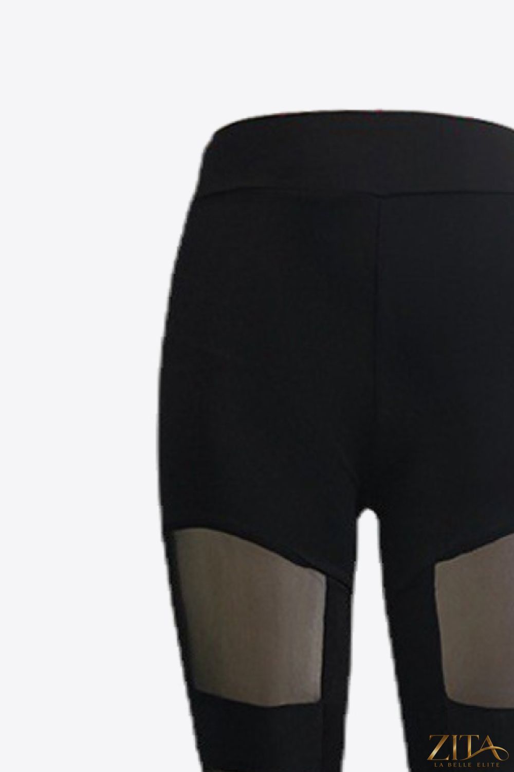 Spliced mesh leggings by Trendsi featuring a stylish design with sheer mesh panels and a comfortable fit.
