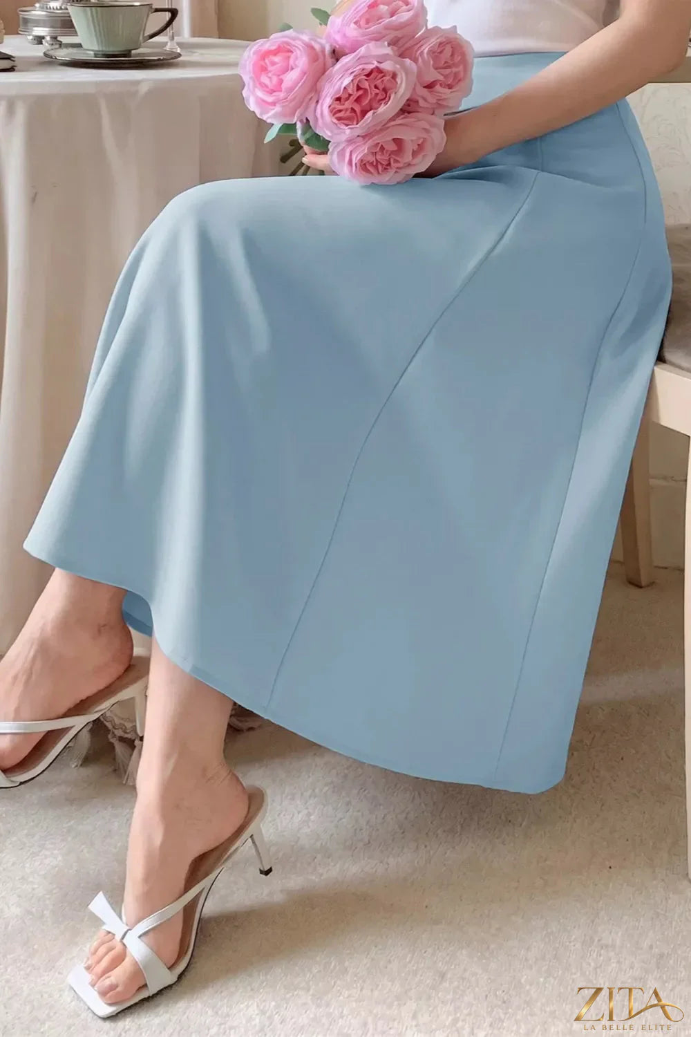 Zita La Belle Elite A-line midi skirt with zipper, shown in black fabric, stylish and flowing for casual or dressy occasions.