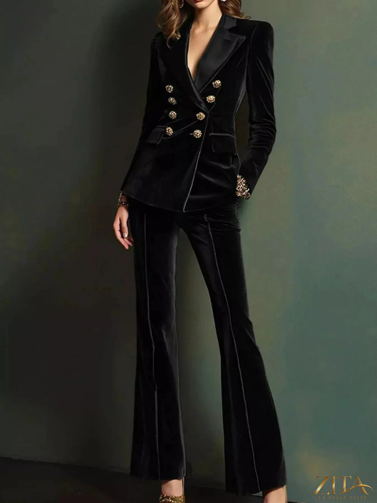 Zita La Belle Elite velvet double-breasted blazer and flare pant set displayed on a hanger, showcasing luxurious fabric and tailored fit.
