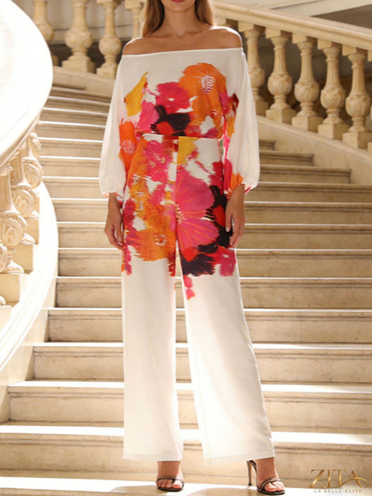 Zita La Belle Elite floral print off-shoulder top and pants set, featuring a stylish, coordinated summer outfit with vibrant floral patterns.