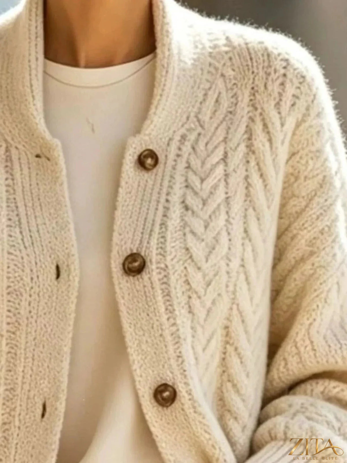Plus size cable-knit button-down cardigan by Zita La Belle Elite, showcasing a full size, cozy knit texture and classic design.