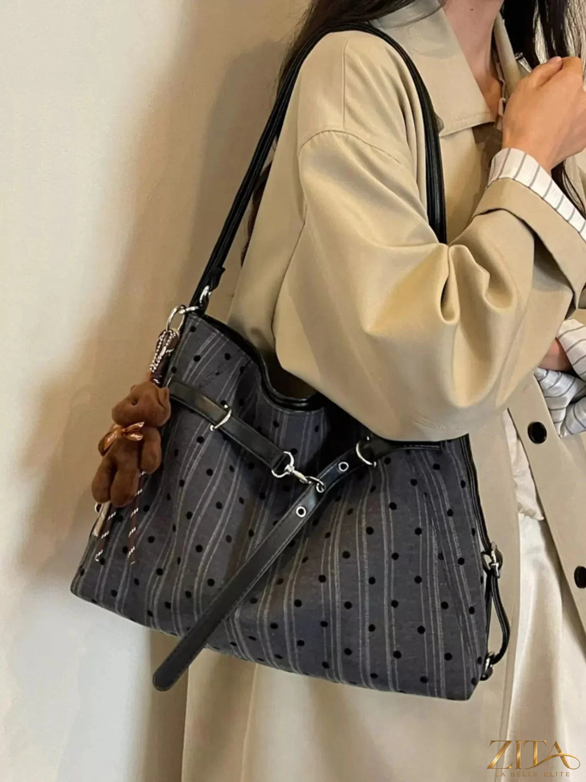 Zita La Belle Elite polka dot shoulder bag with black and white pattern, featuring a stylish strap and compact design.